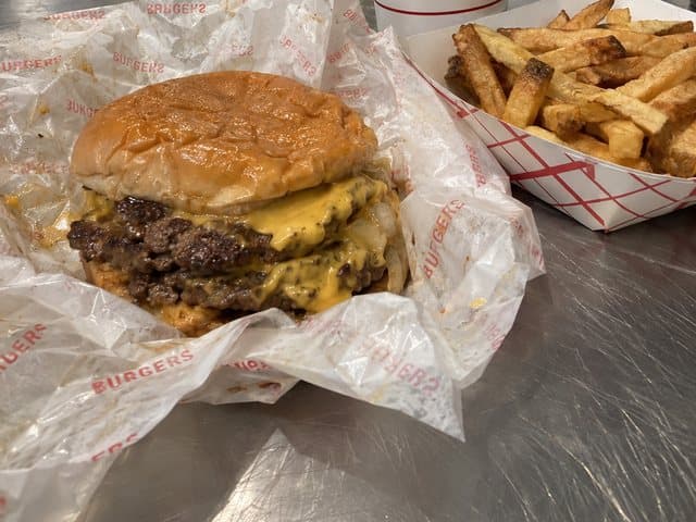 A double cheeseburger and fries at 7th Street Burger